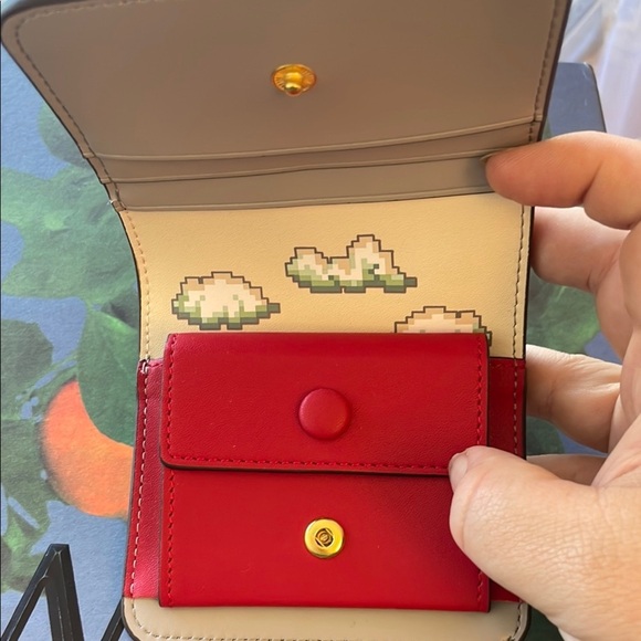 Tory Burch Tan Wallet with Pixel Dinosaur - Picture 3 of 3